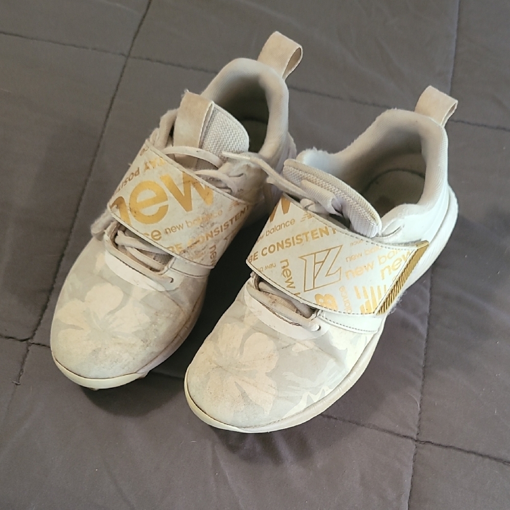 New Balance Cream and Gold Sneakers